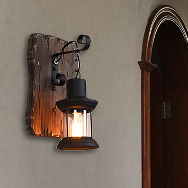 Rustic Clear Glass Caged One-Light Sconce With Wooden Backplate - Black Finish