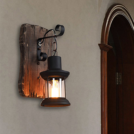 Rustic Clear Glass Caged One-Light Sconce With Wooden Backplate - Black Finish