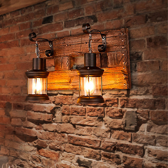 Industrial Lantern Wall Sconce - Clear Glass Black 2-Light Fixture With Wooden Backplate