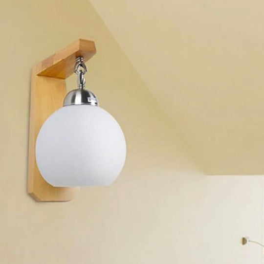 Industrial Wall Sconce With Opal Glass Globe Shade And Wood Backplate - Bedroom Lighting Fixture