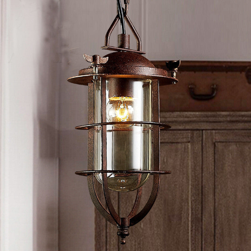 Coastal Rust Caged Lantern Pendant: Clear Glass Single-Bulb Ceiling Light For Living Room