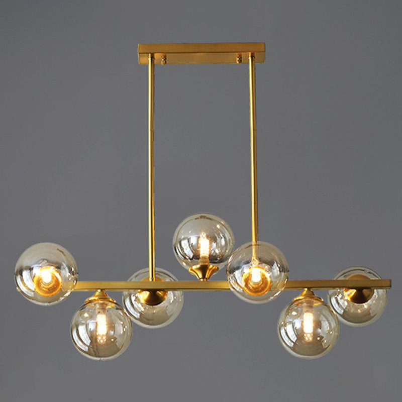 Mid-Century Modern Gold Metal Pendant With Spherical Amber Glass - Island Ceiling Light For Dining