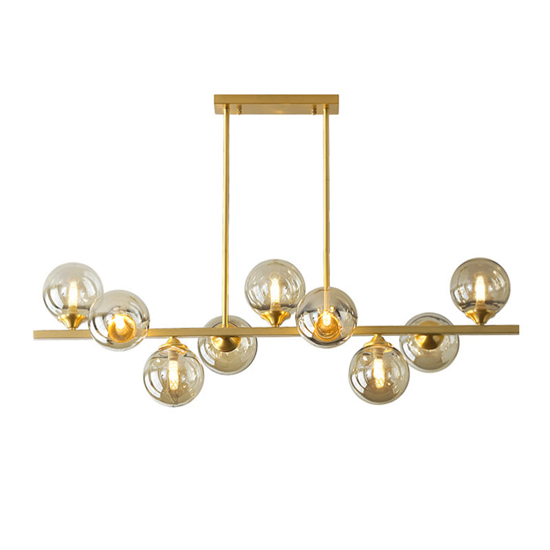 Mid-Century Modern Gold Metal Pendant With Spherical Amber Glass - Island Ceiling Light For Dining