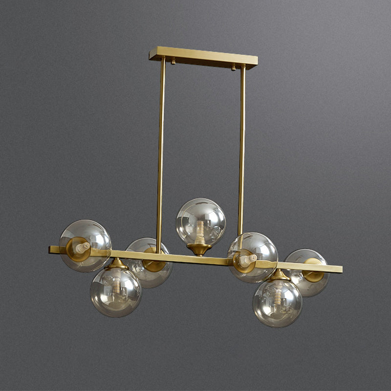 Mid-Century Modern Gold Metal Pendant With Spherical Amber Glass - Island Ceiling Light For Dining