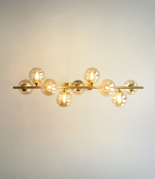 Mid-Century Modern Gold Metal Pendant With Spherical Amber Glass - Island Ceiling Light For Dining