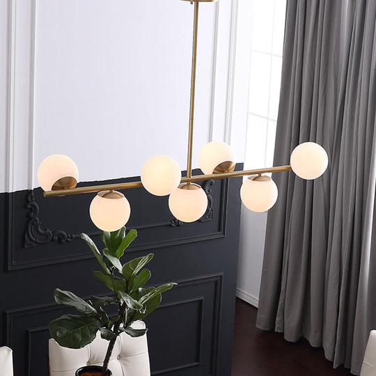 7-Light Modern Gold Metal Island Pendant With Spherical White Glass - Ideal For Dining Table