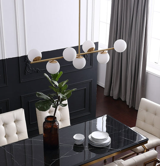 7-Light Modern Gold Metal Island Pendant With Spherical White Glass - Ideal For Dining Table