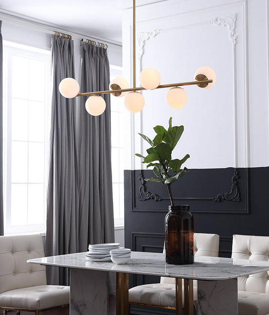 7-Light Modern Gold Metal Island Pendant With Spherical White Glass - Ideal For Dining Table