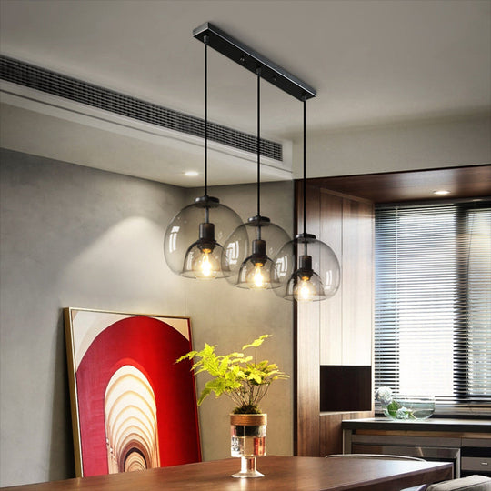 Minimalist Black Glass Pendant Light For Modern Dining Rooms