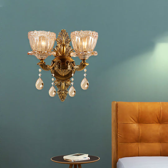 Modern Floral Shaped Wall Sconce Light With Amber Glass And Teardrop Crystal Drop In Brass - 1/2