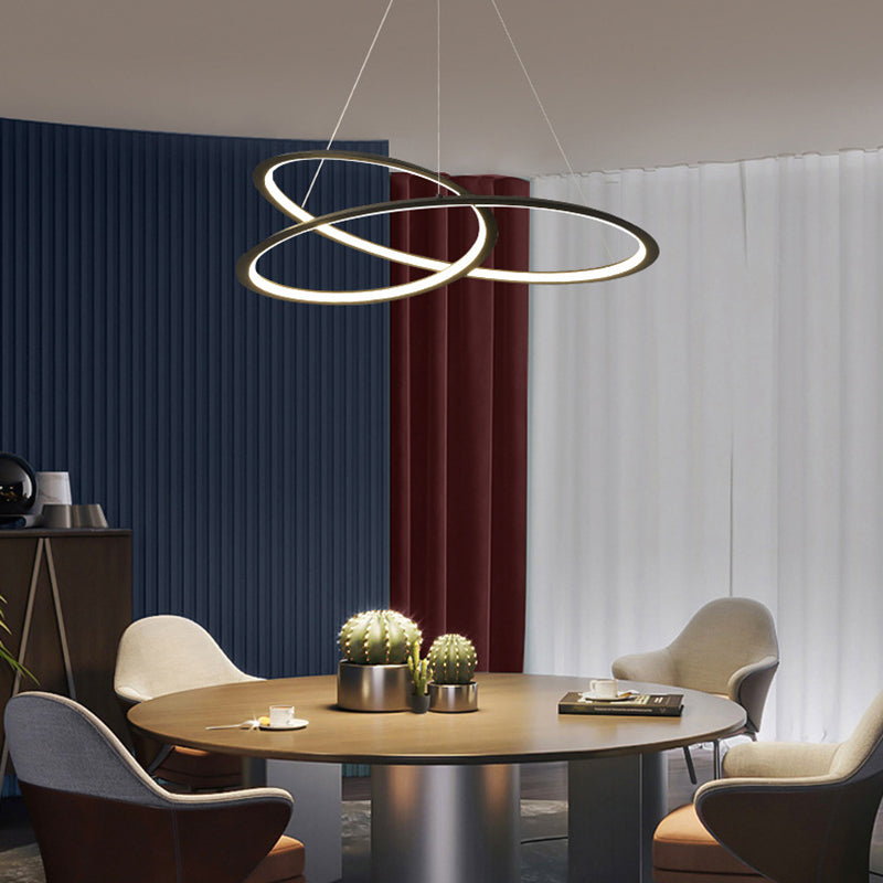 Metal Led Chandelier: Sleek Seamless Curves For Minimalistic Dining Room Lighting