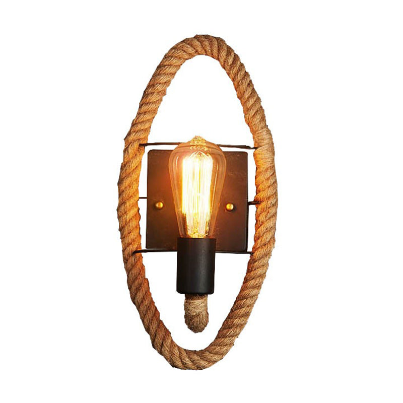 Rustic Indoor Wall Light With Wagon Wheel Design And Rope Shade