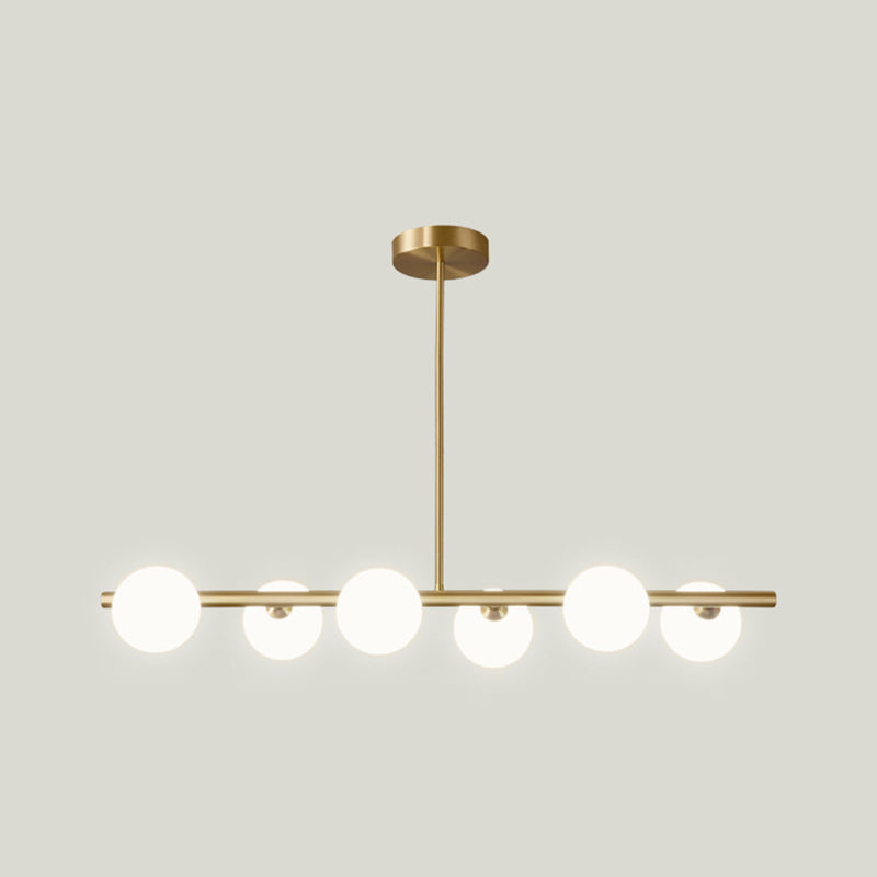 Sleek and Elegant Linear Gold Island Pendant Lighting with Spherical Glass Shades for Dining Table