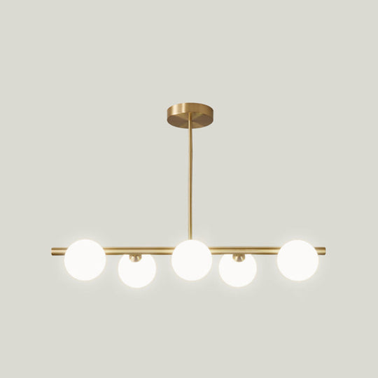 Gold Linear Island Pendant Light with Spherical Glass Shade - Perfect for Dining Table and Minimalist Decor