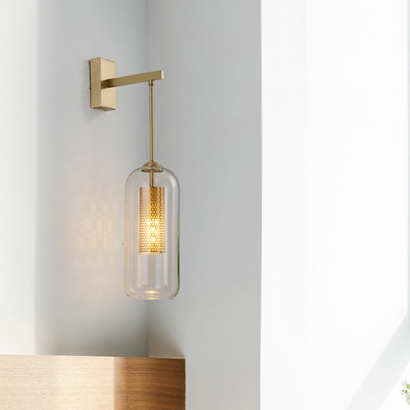 Modern Clear Glass Capsule Wall Light Sconce With Gold Arm - Stylish Indoor Lighting