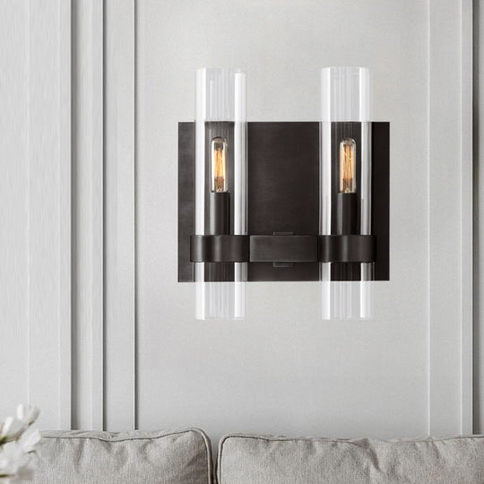 Modern 2-Headed Wall Sconce: Clear Glass Symmetrical Tube Black/Brass Finish