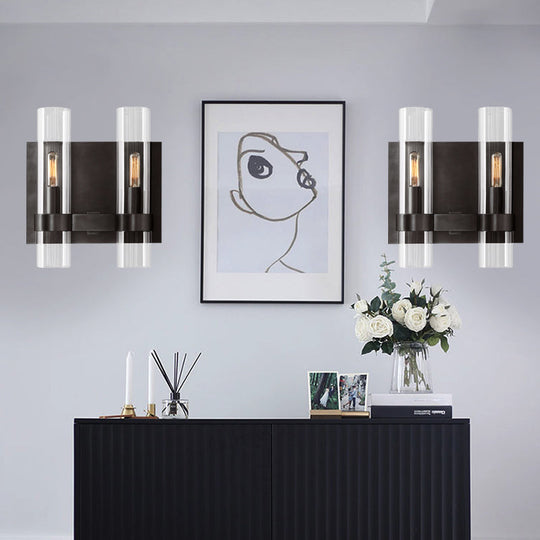 Modern 2-Headed Wall Sconce: Clear Glass Symmetrical Tube Black/Brass Finish