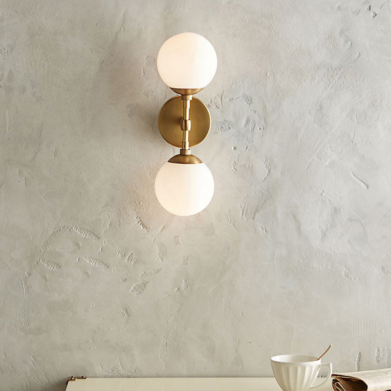 Minimalist Milky Glass 2-Light Wall Sconce - Brass Finish