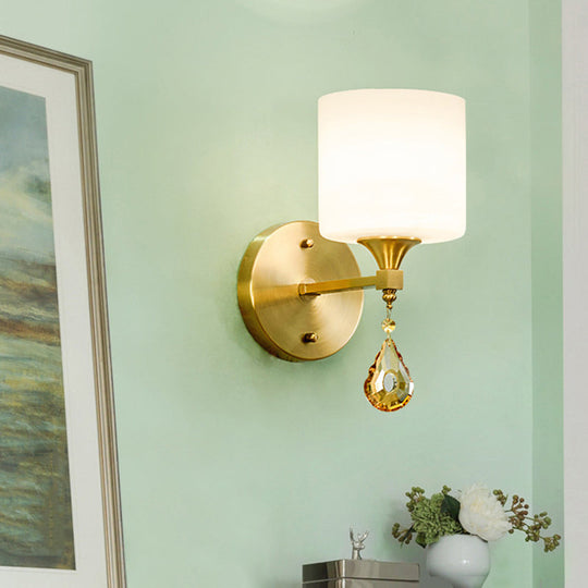 Modern Milk Glass Wall Sconce With Brass Finish And Amber Crystal Draping 1 /