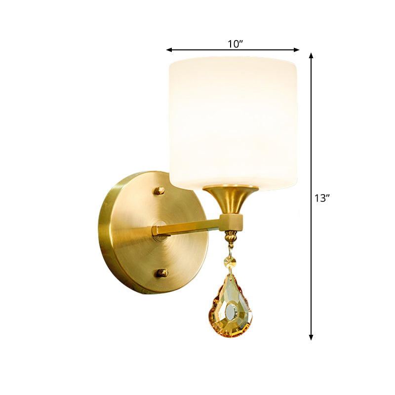 Modern Milk Glass Wall Sconce With Brass Finish And Amber Crystal Draping