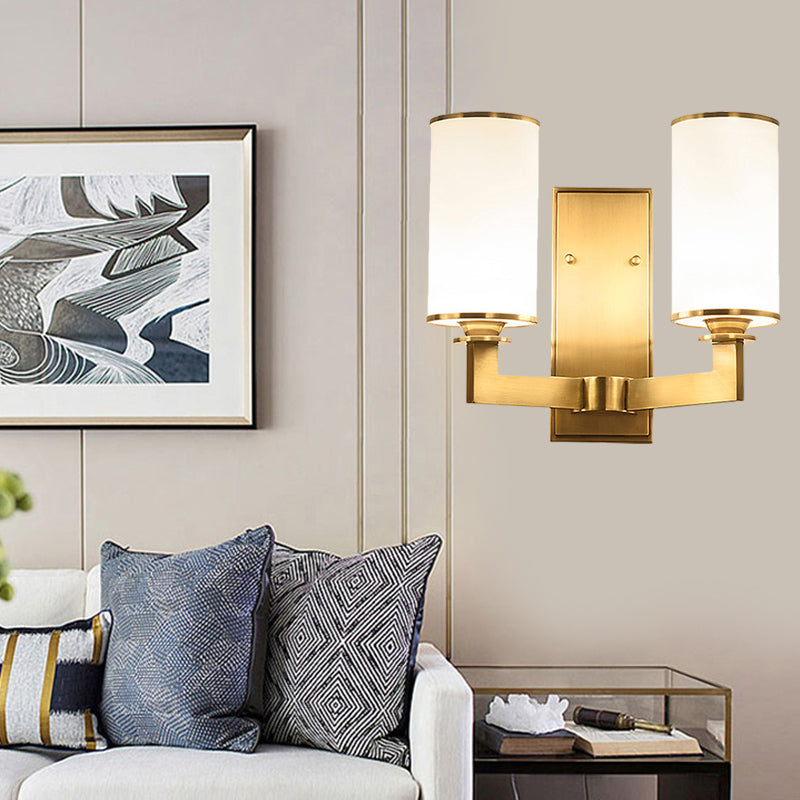 Modern Cylinder Wall Lamp 1/2-Head Frosted Glass Fixture In Brass For Living Room - Modernism Style