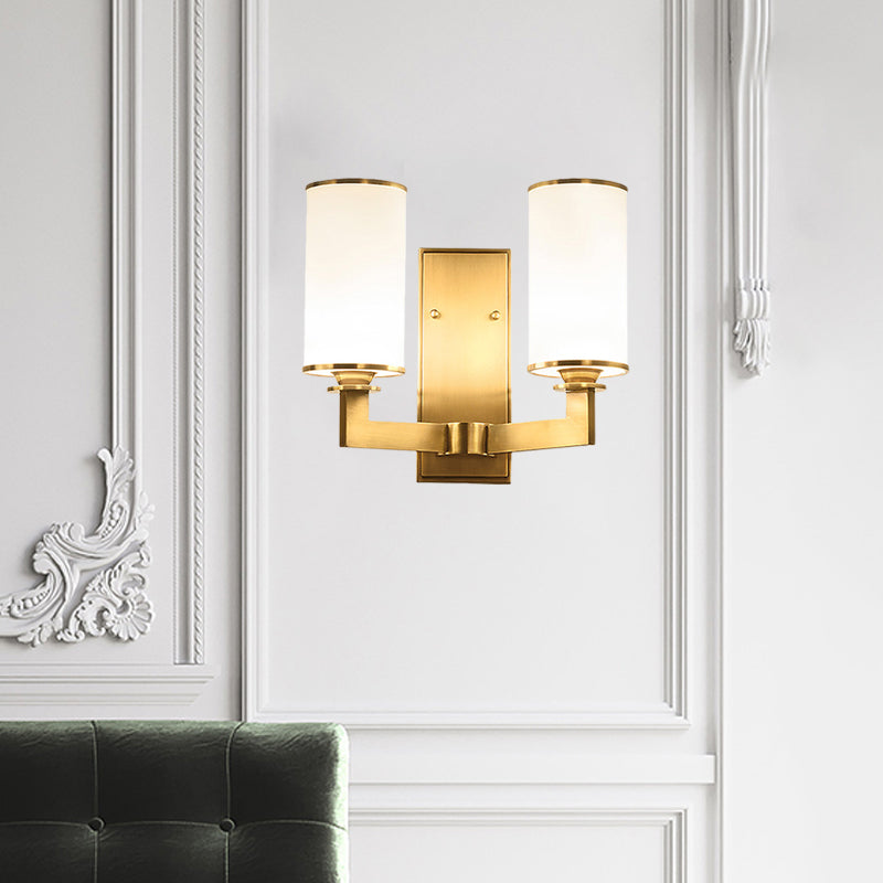 Modern Cylinder Wall Lamp 1/2-Head Frosted Glass Fixture In Brass For Living Room - Modernism Style