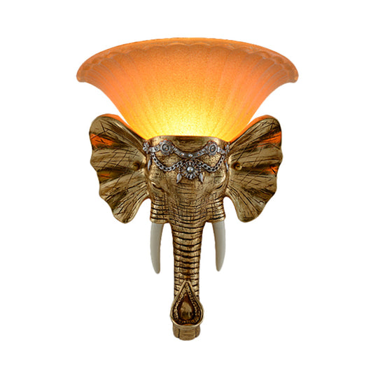 Modern Amber Glass Sconce With Gold Elephant Accent