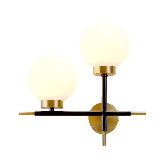 Post-Modern White Glass Sphere Wall Sconce With Brass Finish - 1/2 Bulbs