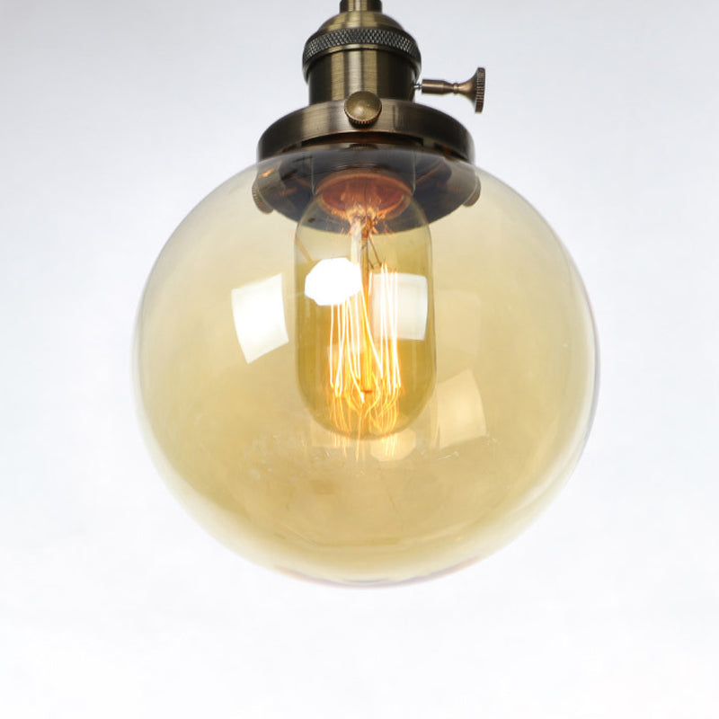 Farmhouse Orbit Pendant Light with Amber/Clear Glass and Adjustable Cord in 3 Elegant Finish Options