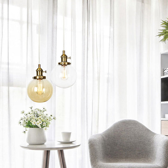 Farmhouse Hanging Pendant Light With Adjustable Cord And Amber/Clear Glass In Black/Bronze/Brass