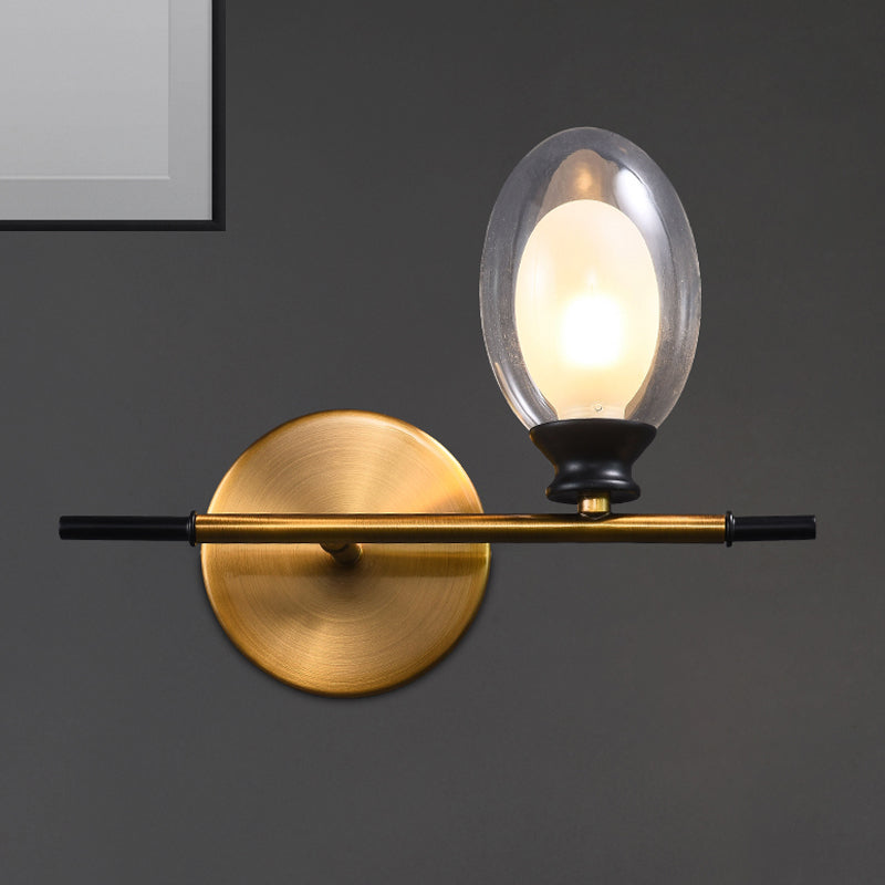 Elegant Clear/Amber Glass Egg Shape Wall Light - Minimalist 1 Brass Sconce Clear