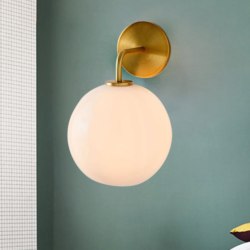 Modern Glass Orb Wall Sconce With Brass Arm Clear/White White