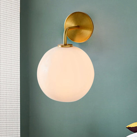 Modern Glass Orb Wall Sconce With Brass Arm Clear/White White