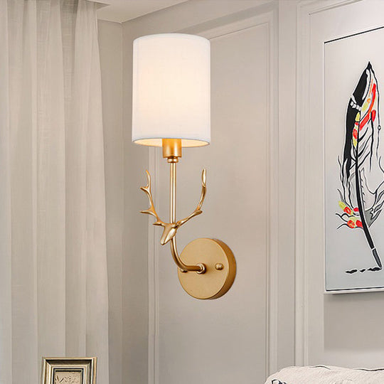 Contemporary Cylinder Wall Sconce With Fabric Shade - Coastal-Inspired Living Room Lighting In