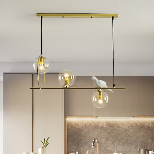 Modern Clear Glass Pendant Light Fixture With White Bird - Global Island Lamp Gold Trim 3 Heads