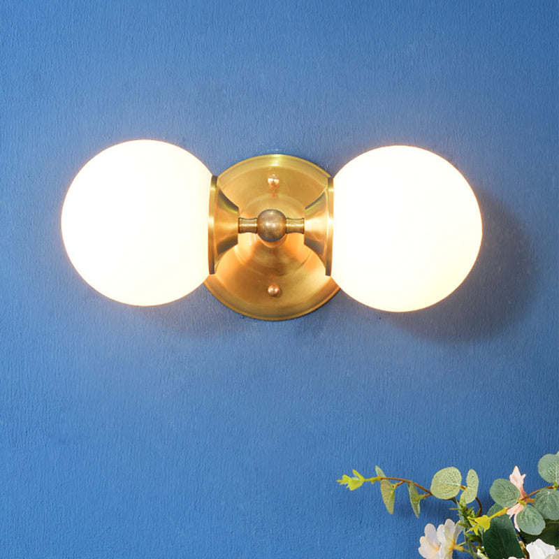 Modern Brass Wall Mount Sconce With 2 Milky Glass Heads