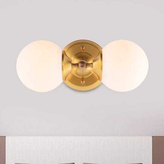 Modern Brass Wall Mount Sconce With 2 Milky Glass Heads