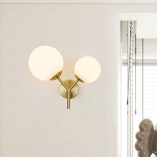 Contemporary White Glass Spherical Sconce With 2 Gold Heads - Wall Mounted Light Fixture