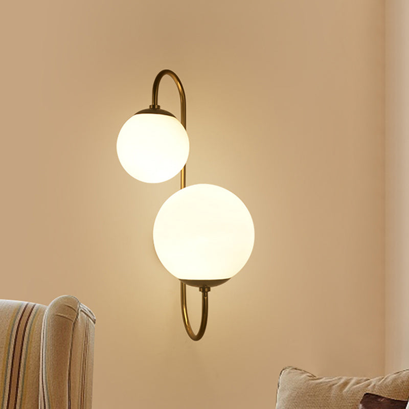 Contemporary Gold Metal Wall Sconce With Opal Glass Shade - 2 Bulb Arm Design