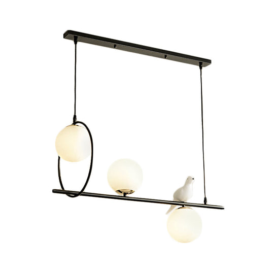 Modernist Milk Glass Pendant Lamp With 3 Globe Heads And Bird Accent - Black Finish