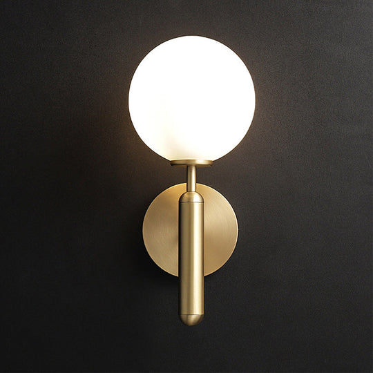 Milky Glass Ball Sconce - Contemporary 1-Head Brass Wall Light Fixture With Metal Arm