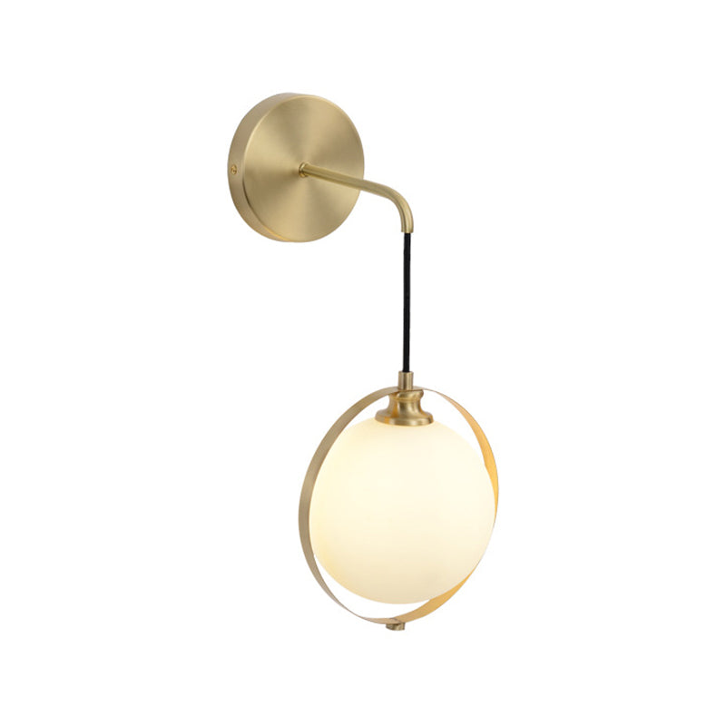 Modern White Glass Ball Sconce Light With Brass Wall Mount And Curved Arm - 1 Bulb