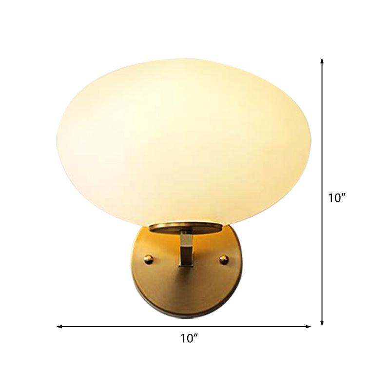 Modern Milk Glass Wall Sconce With Brass Finish