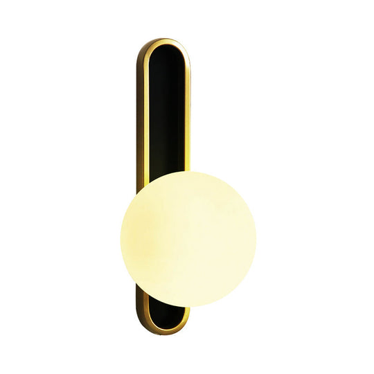 Modern Clear/Cream Glass Orb Wall Light With Brass Mount