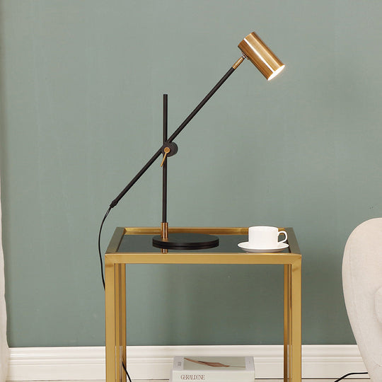 Modern Metal Cylinder Table Lamp In Black And Gold With Rotating Node