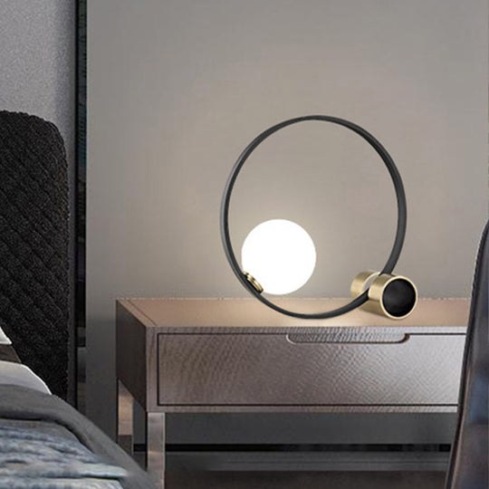 Modern Metal Desk Lamp: Circle Bulb Nightstand Light In Black With Milk Glass Shade