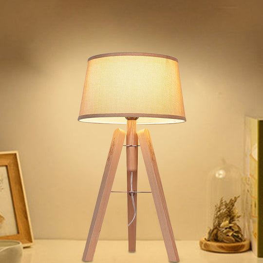 Modernist Fabric Tapered Desk Lamp With Wood Tripod - 1 Bulb Night Table Light In Brown/Beige