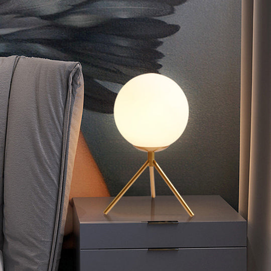 Modern Opal Glass Sphere Desk Lamp With Metal Tripod In Gold/Black