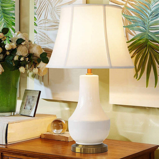 White Modern Bell Shape Desk Lamp With Ceramic Base - Fabric Shade 1 Bulb Table Light