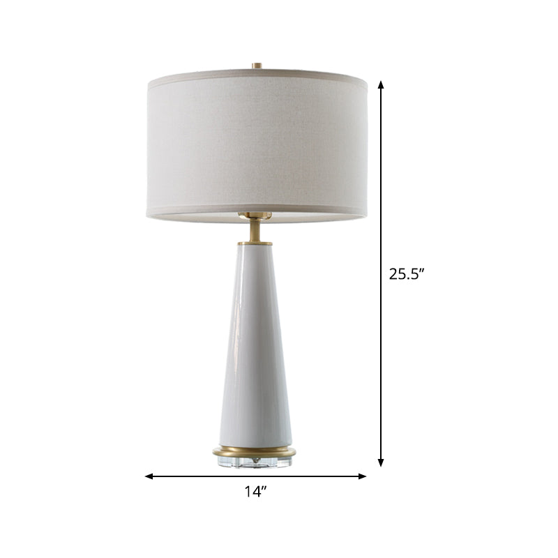 Modern White Fabric Cylinder Table Light With Cone Ceramic Base - 1 Bulb Desk Lamp